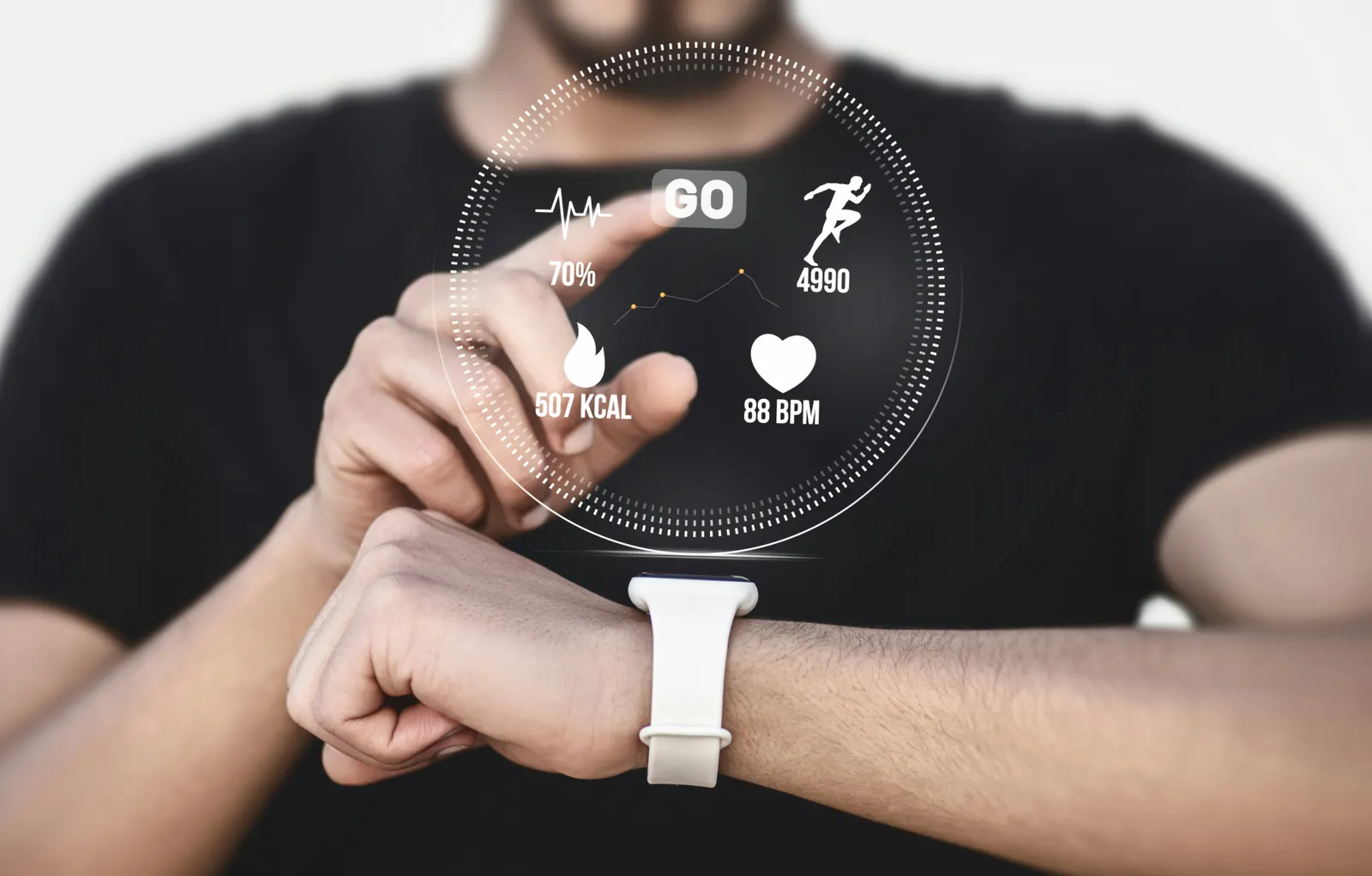 Man tapping a white smartwatch with a floating overlay showing heart rate, calories and step count
